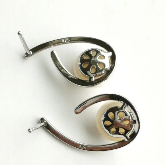 Cultured white pearl stud earrings in modern Sterling Silver setting - Picture 4 of 6